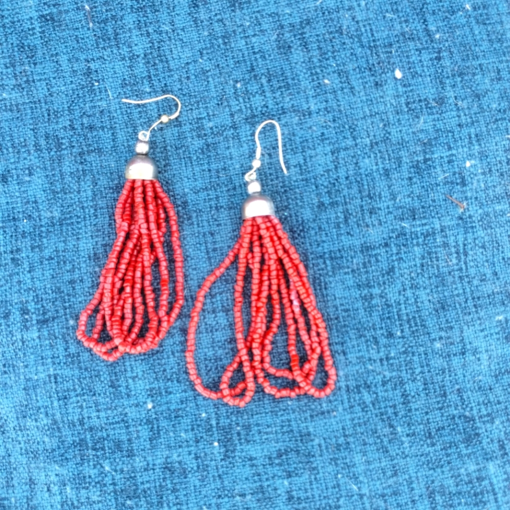 Coral seed bead multi-strand necklace and earrings set.